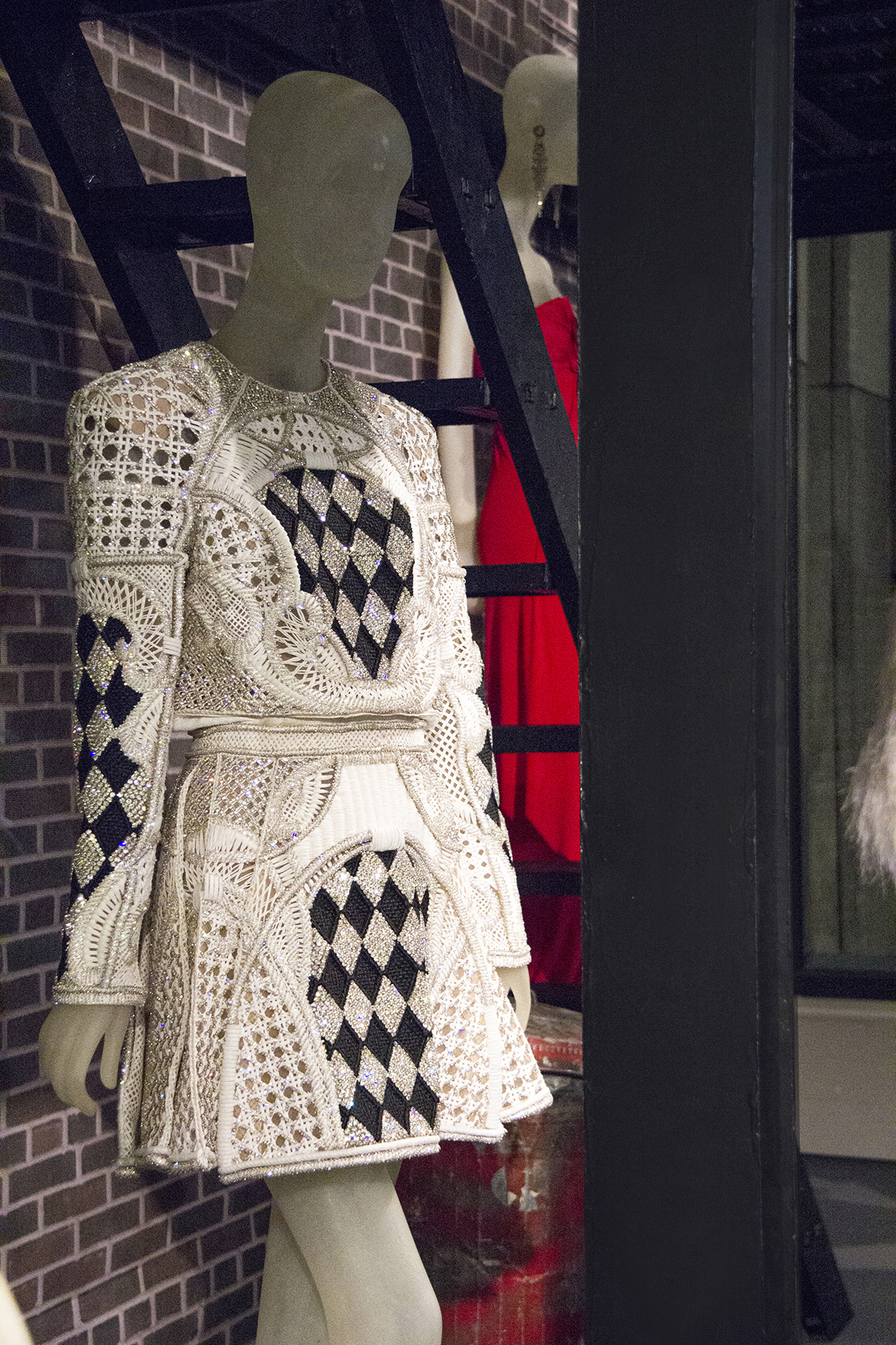 Costume Designer Tom Broecker selected this Balmain (SS13) black and white weave harlequin dress to be featured in the exhibit.